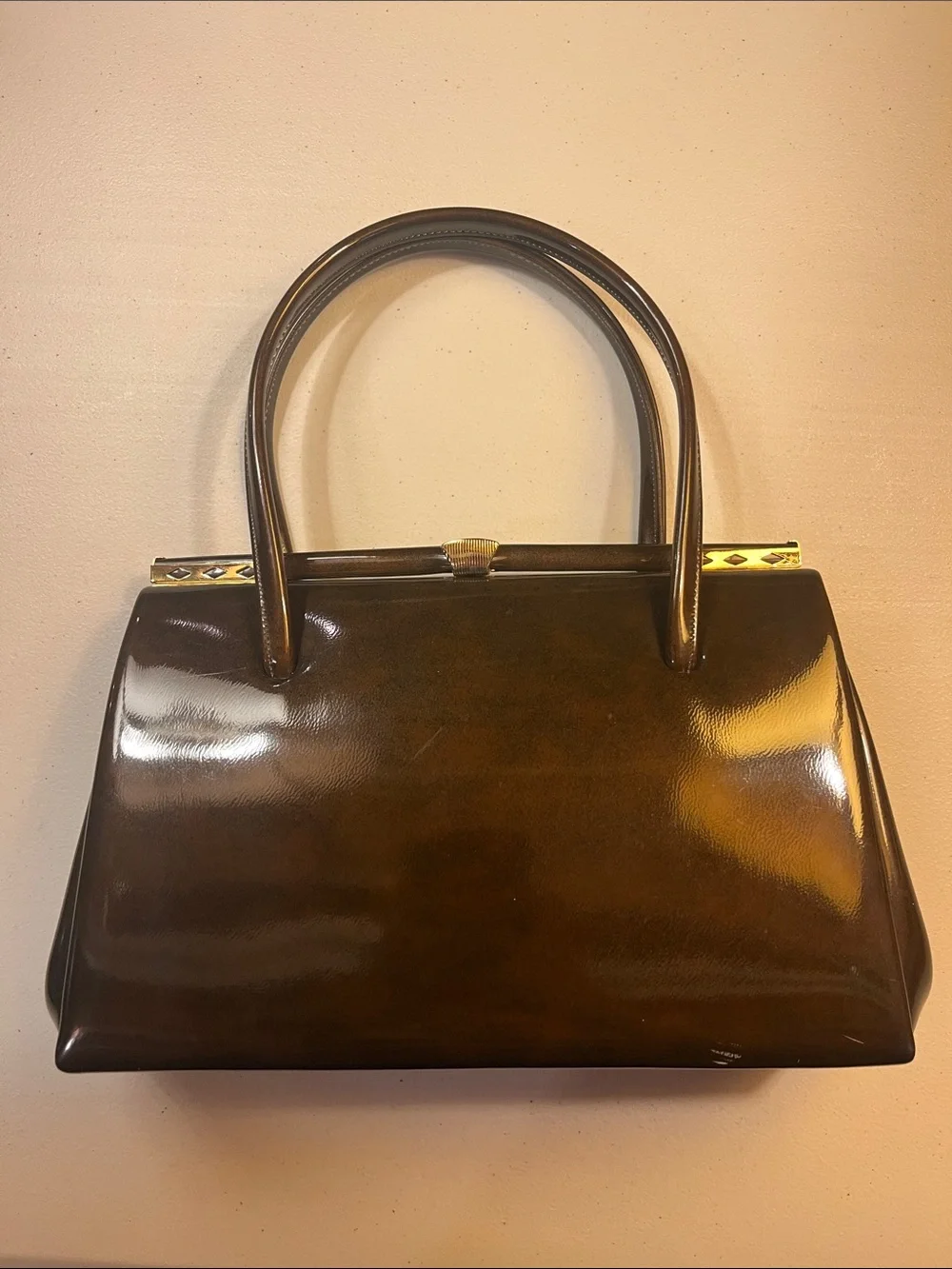 Structured Patent Leather Satchel in Dark Brown with Gold Accents